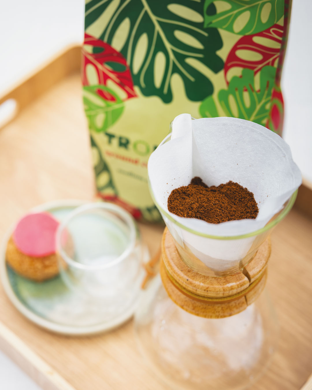 Pour-over dripper with Tropicalia ground coffee and packaging bag